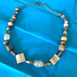 Lovely white and silver colored necklace